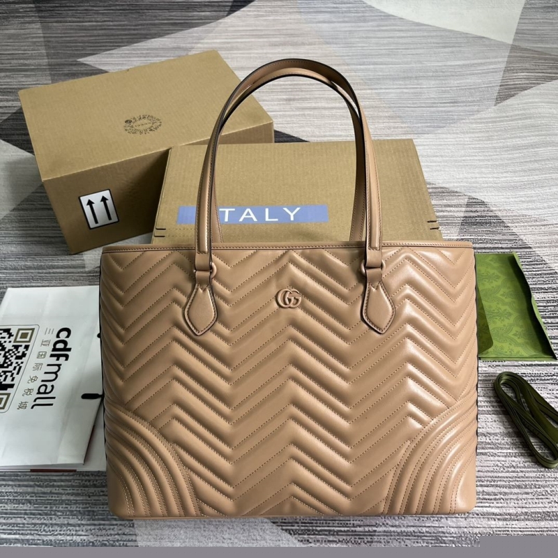 G*u*i shopping bags